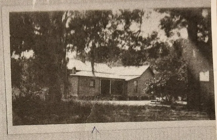 Historic photo of the original house from circa 1910