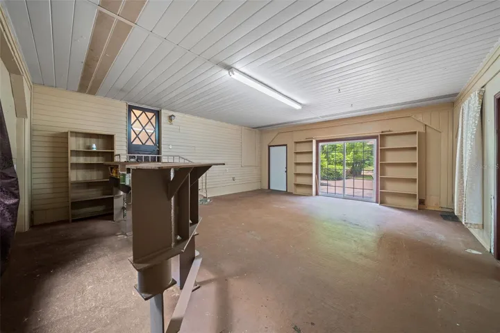 Game Room with French Doors and I-Beam Bar
