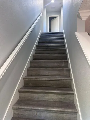 Stair way to loft and 2nd floor bedrooms