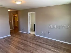 Master Bedroom with View to Master Built-In Closet