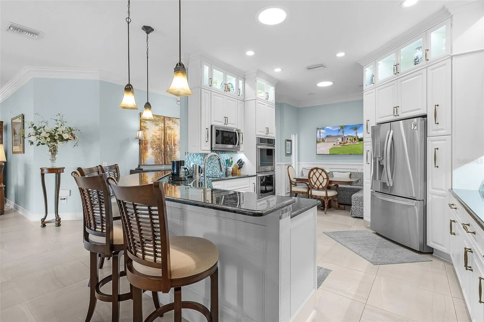 Enjoy the tile backspash adding color and charm