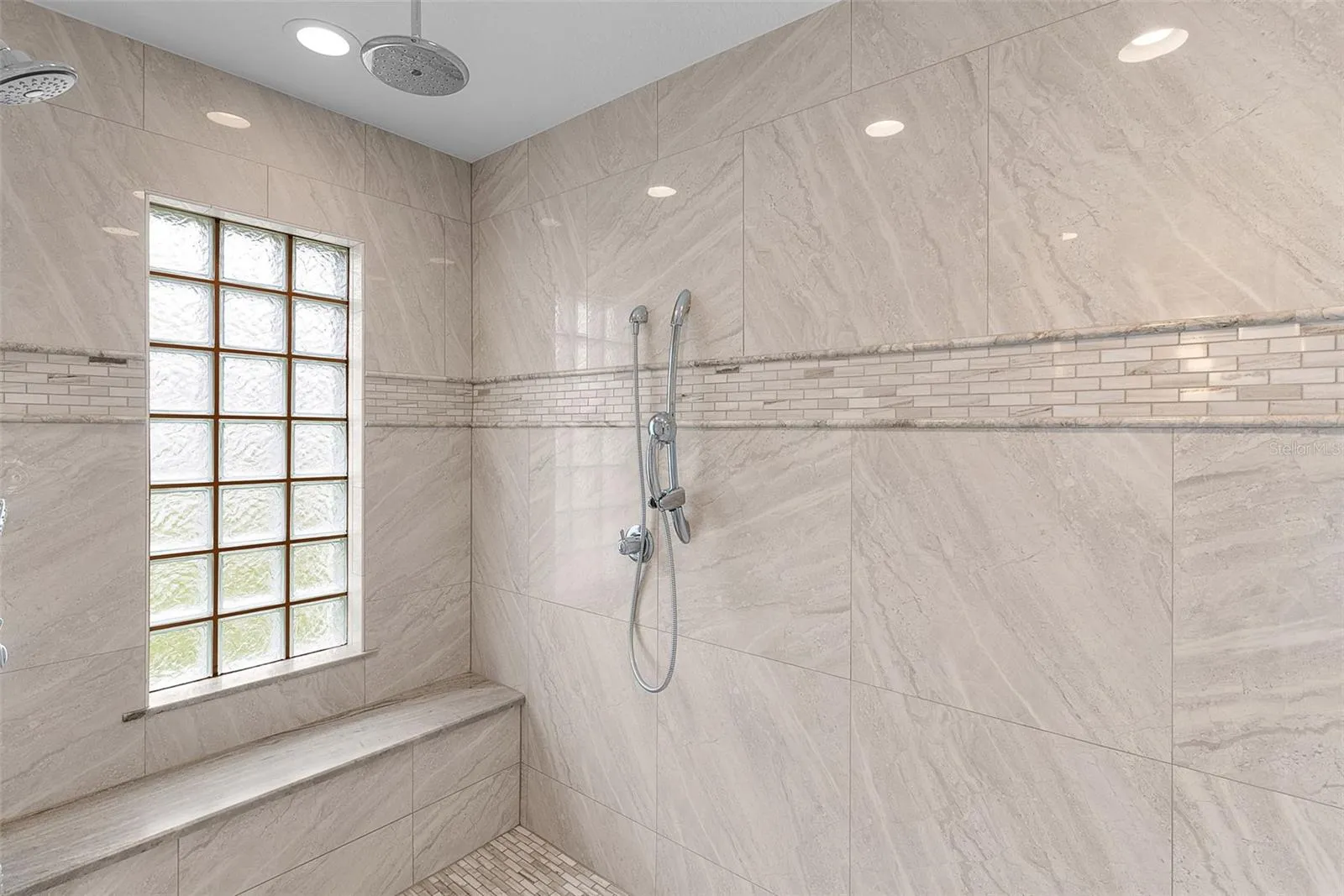 Look at all the shower heads including overhead!
