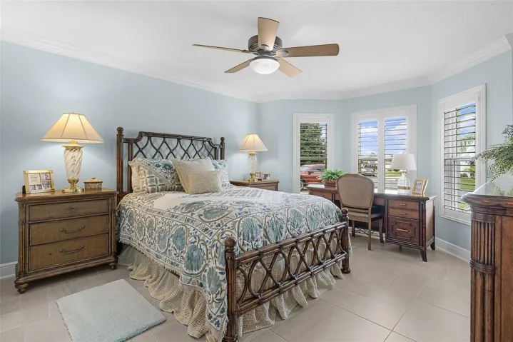 3rd guest room with high ceilings and a beautiful view out the front windows