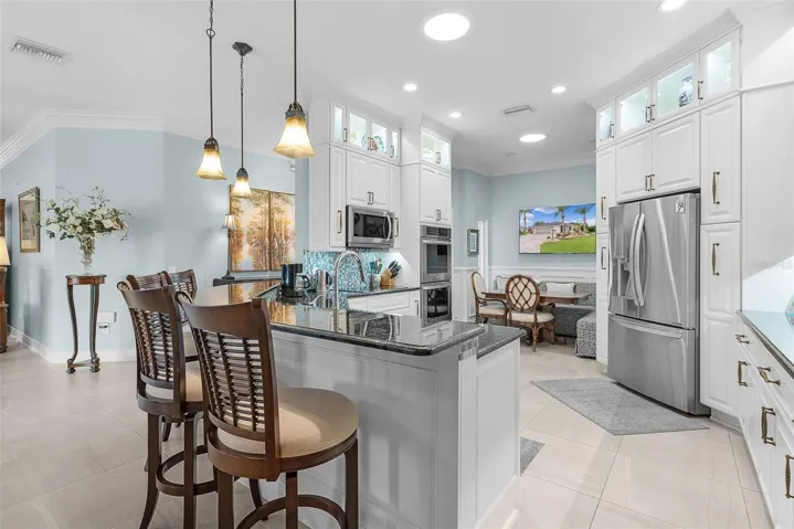 Enjoy the tile backspash adding color and charm