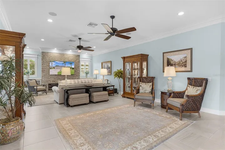 Living room with a peak at the beautiful gas fireplace