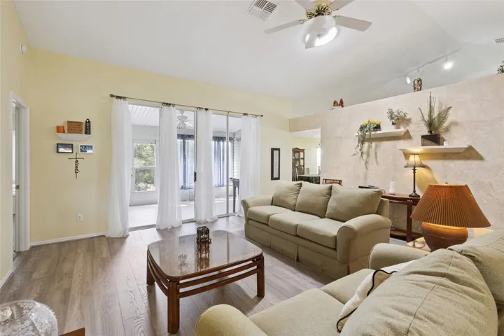 Living Room with view of enclosed Florida Room