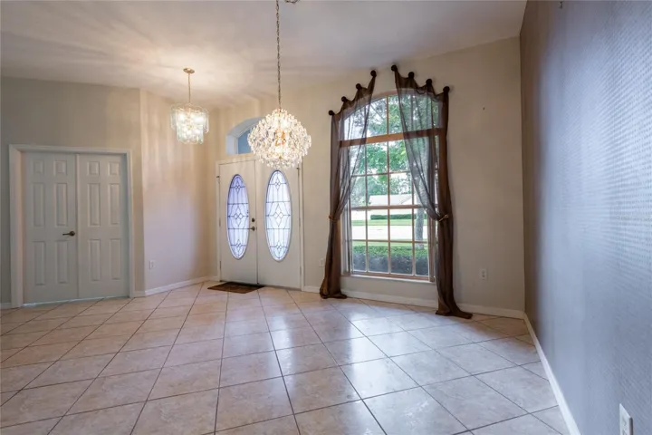 LOOKING INTO DINING AREA AND OFFICE
