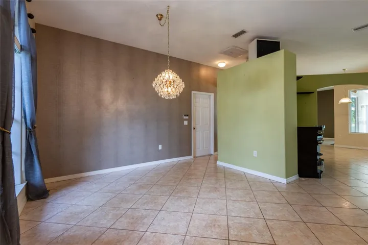 DINING ROOM AREA WITH CHANDELIER