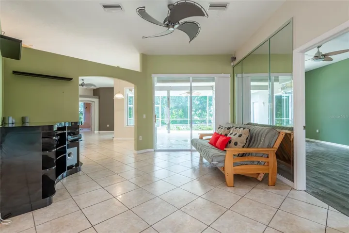 FROM GREAT ROOM SHOWING SOUNDS SYSTEM LOOKING INTO LANAI