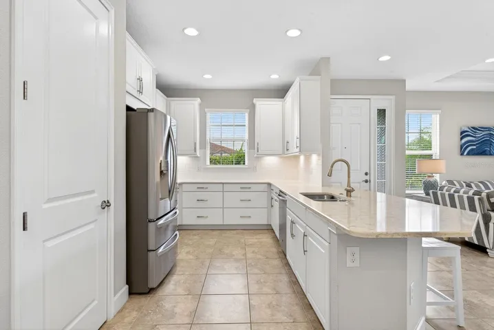 Large pantry and stainless steel appliances