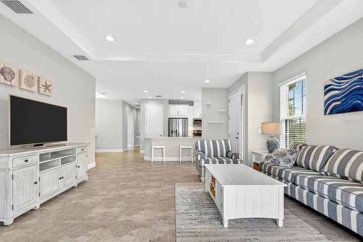 Open concept living/Gray tile throughout all living spaces besides 2 bedrooms