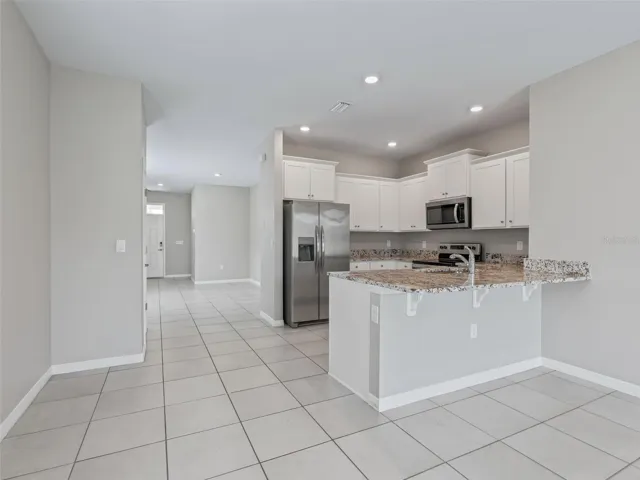 Kitchen looking toward the front door
