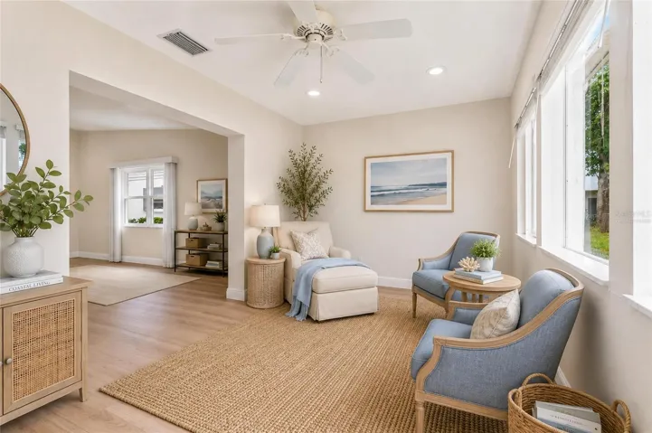 Enclosed, air-conditioned lanai virtually staged