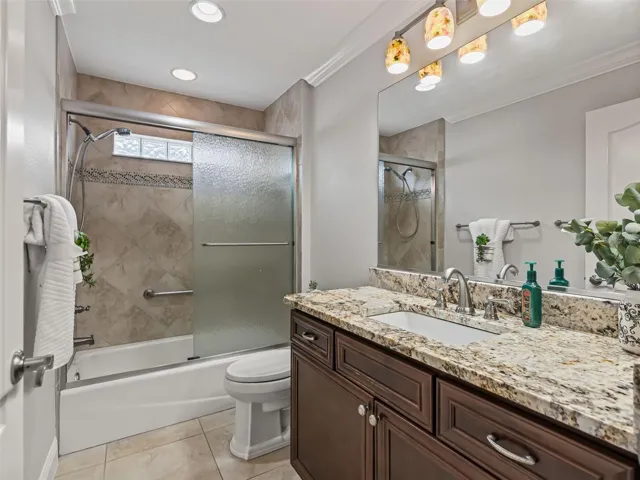 Guest Bath, tile, tub - shower, granite counters, crown moulding