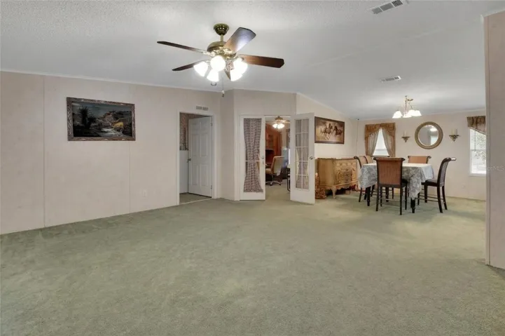 looking at door to primary bedroom, double door to bonus room