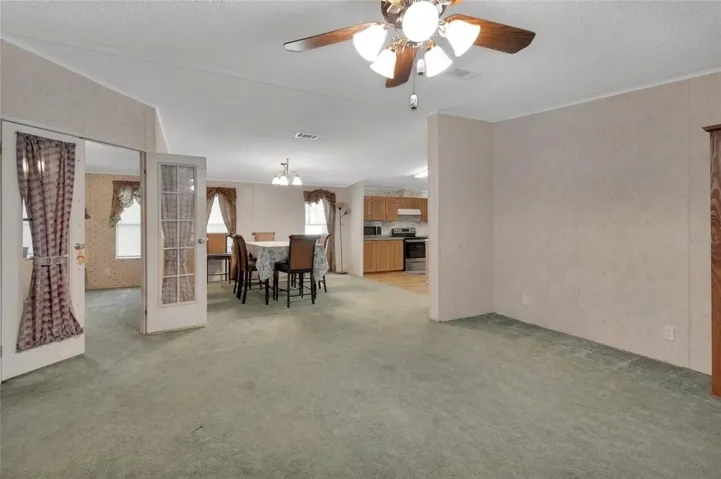 view of living, dining and kitchen
