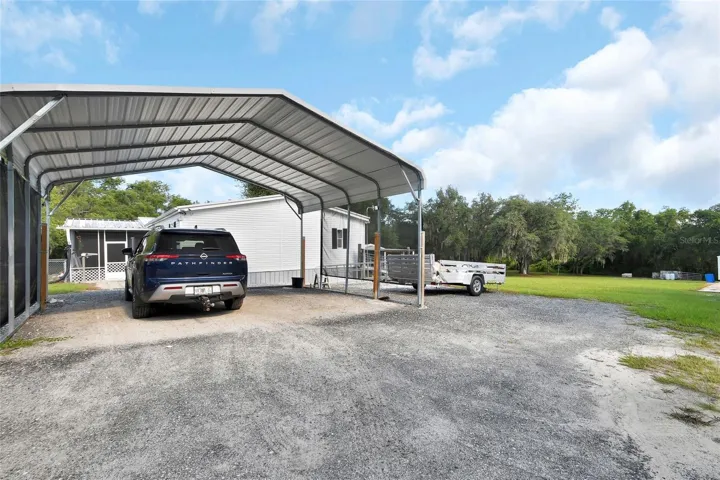 double carport   ground cover is millings
