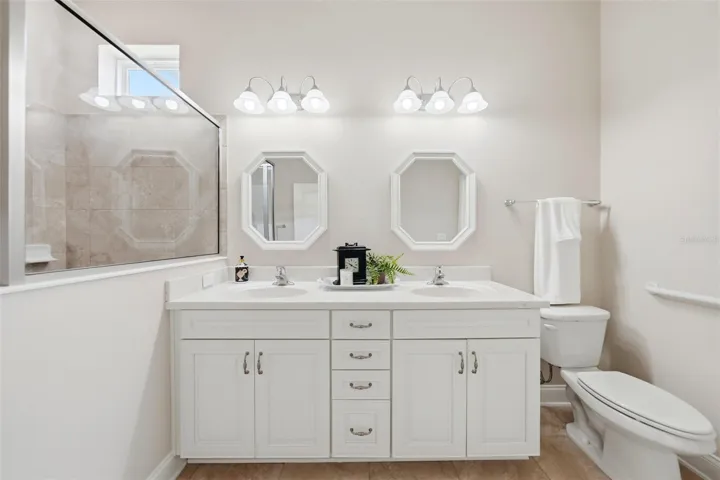 Primary ensuite with dual sink vanity