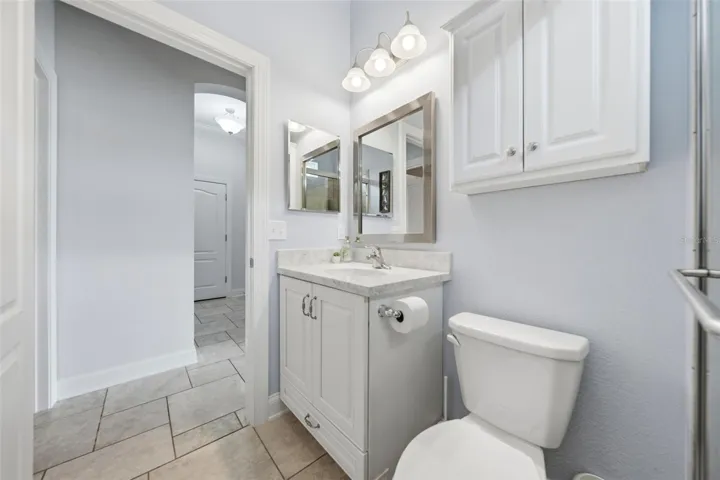 Bathroom 3 features tiled walk-in shower