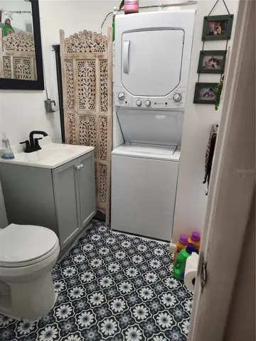 Half bath with laundry off of the garage.
