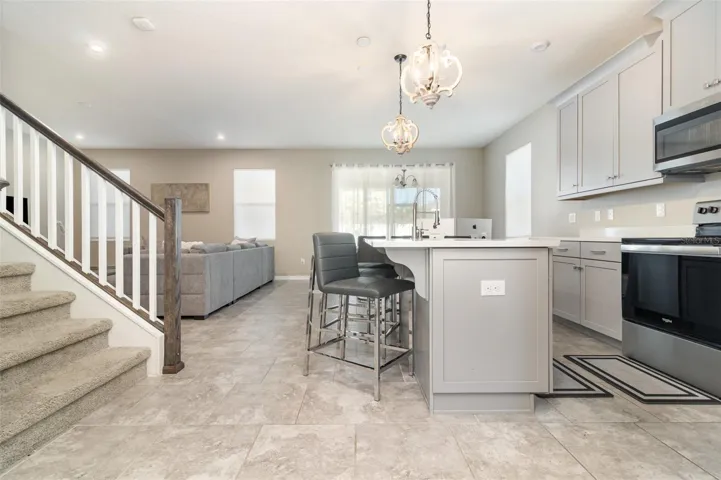 Open Concept with Stairs Leading to 2nd Level