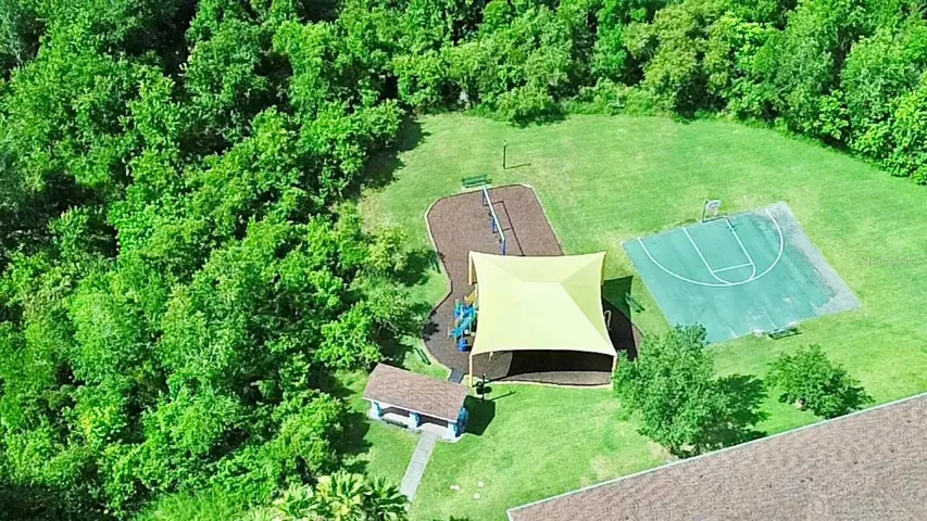 Community Playground with Shade and Basketball Court