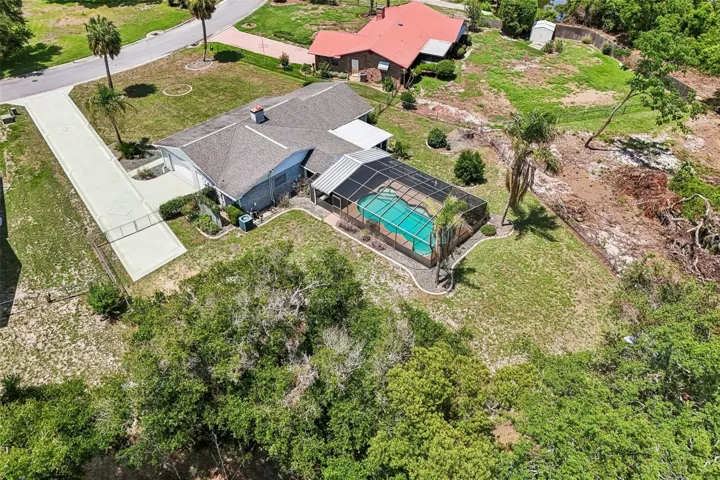 Ample parking with a long driveway and additional parking pad.