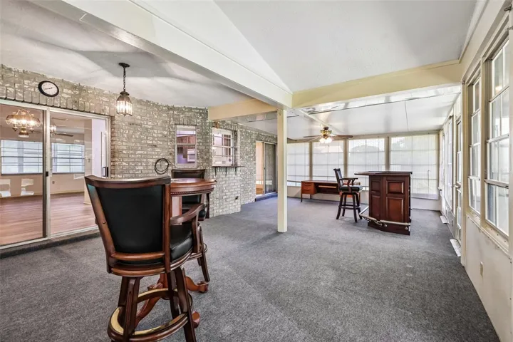 Huge enclosed lanai/Florida room.