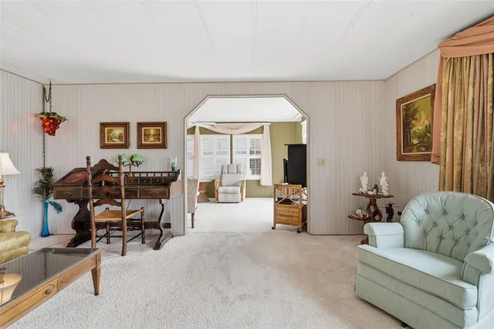 Living room adjoins to media room