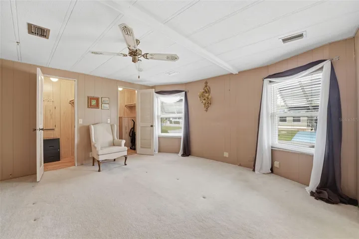 Spacious primary bedroom with 2 walk-in closets