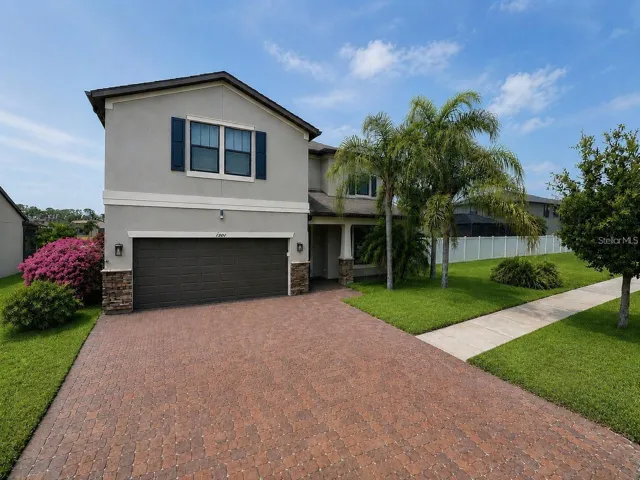 Expansive Custom Driveway with Parking for Multiple Vehicles