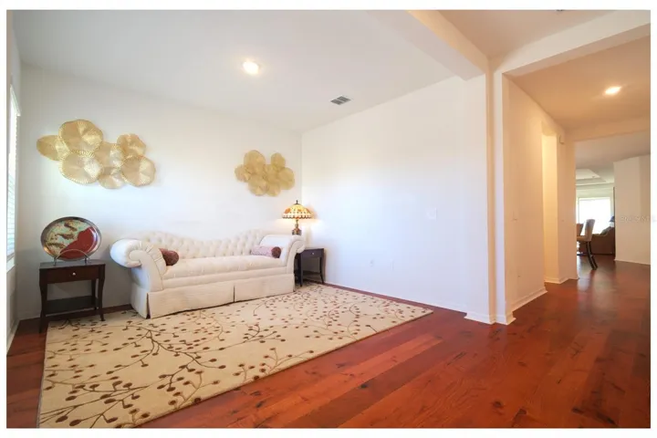 Formal living room in front of the home