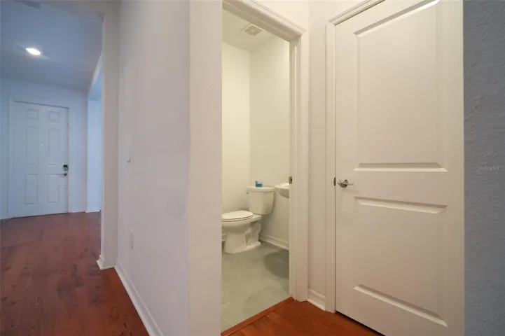convenient powder room near front of home for guests