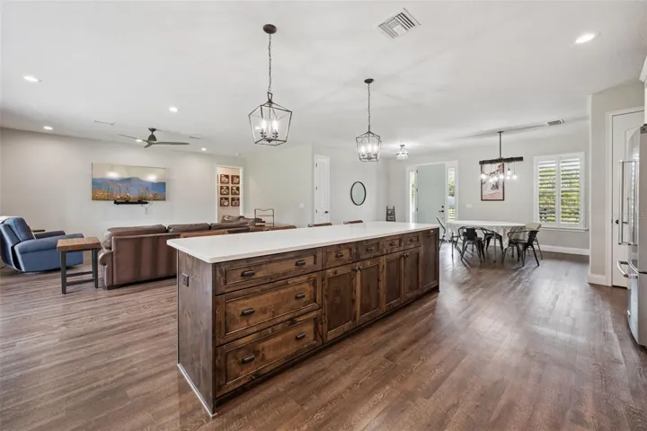 Prepare food and overlook the living room at the same time.