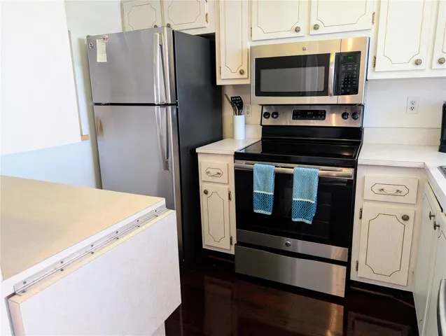 Kitchen - folding shelf extends counterspace