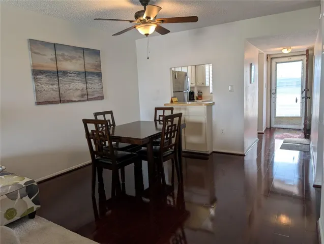 Dining area - gorgeous flooring. View towards entry & kitchen