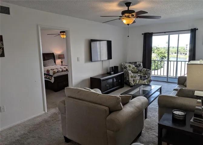 Living room with view of lake beyond