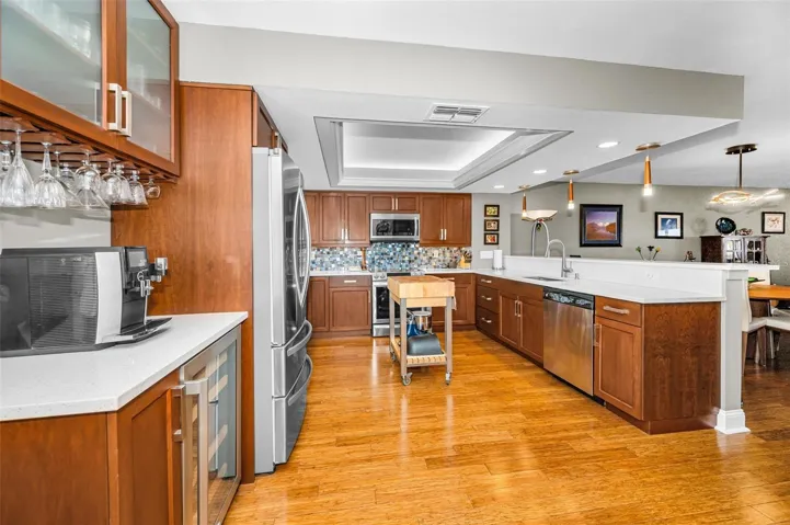 Updated kitchen with quartz counters, stainless steel appliances