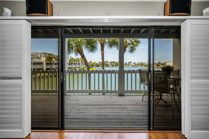 Sliders with plantation shutters to the balcony