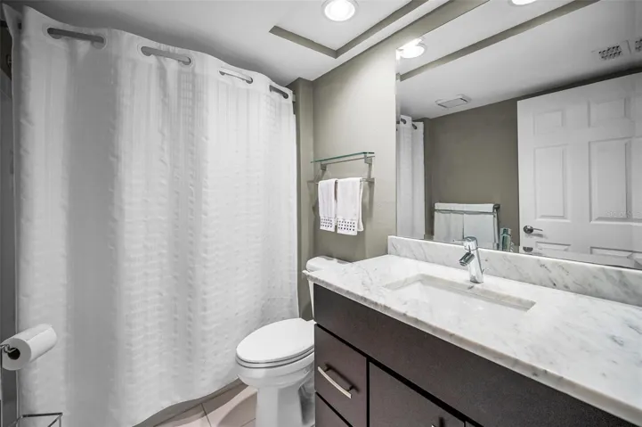 Updated guest bathroom with tub