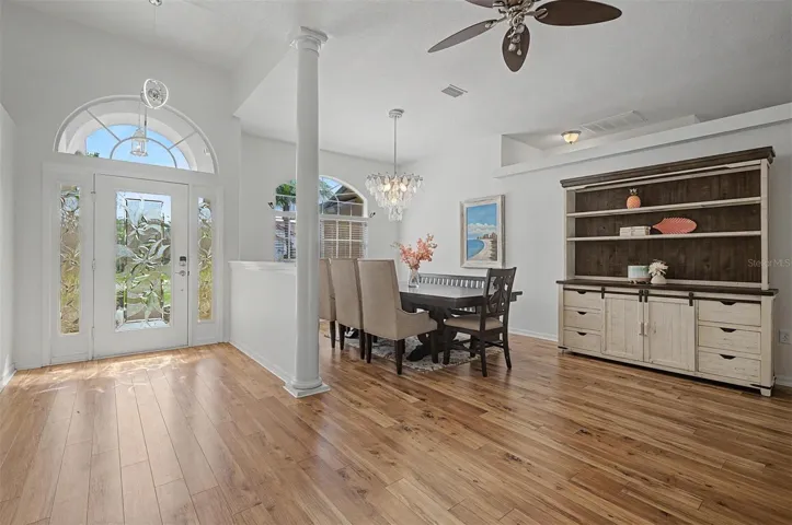 Welcoming entry adjoins dining area