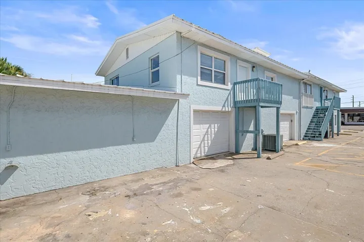 Second story is currently configured as a residential space, allowed in SBI zoning