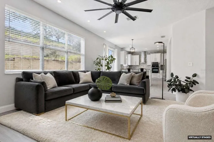 *Virtually staged* Family room opens up to the kitchen