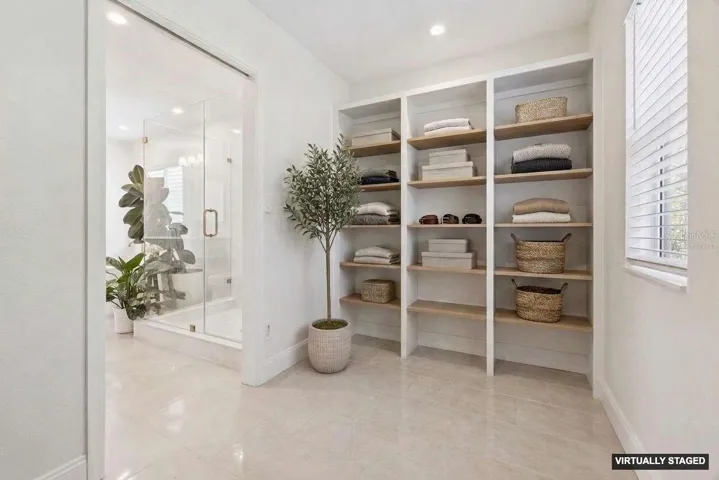 *Virtually staged* walk in closet in the primary
