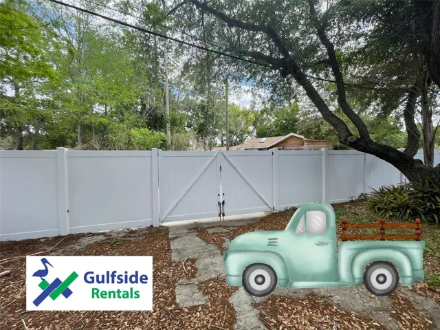 Double gate allows for additional parking of vehicles or small boat