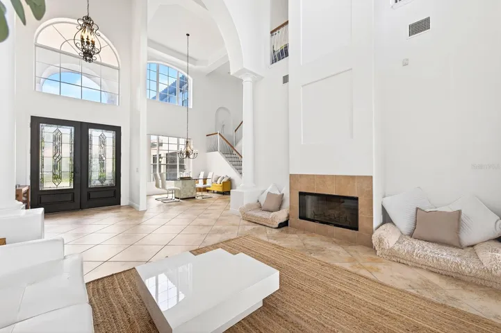 BEAUTIFUL CERAMIC TILE FLOORING flows throughout the main living areas, while CUSTOM WINDOW MOLDINGS (2020) enhance the home's refined character.