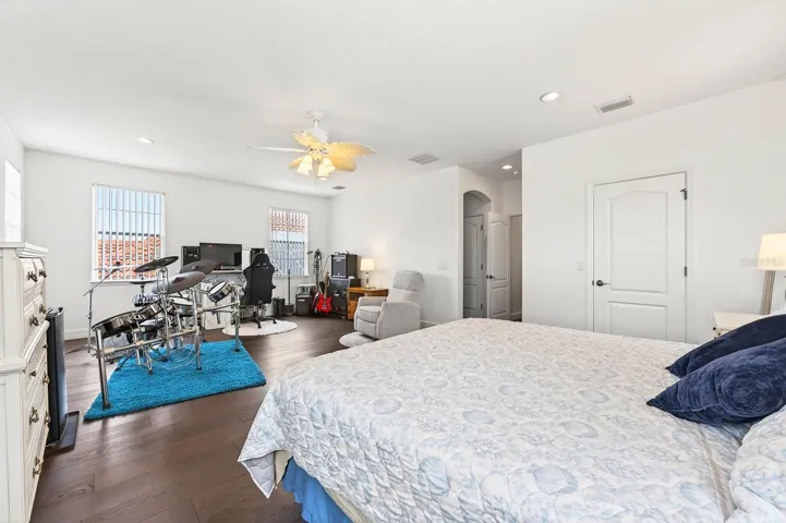 A SECOND PRIMARY SUITE with its own PRIVATE EN SUITE BATH, makes it ideal for guests or multi-generational living. Bedroom 4