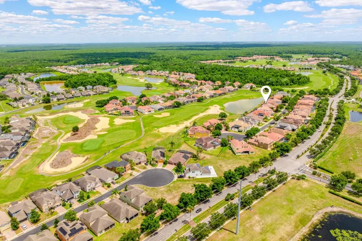 Aerial view of the home and community