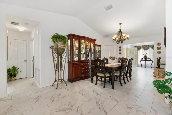 Dining room with 2nd bedroom and bath to the left of picture