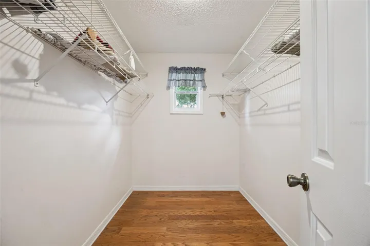 one of two walk-in closets (Primary Bedroom)